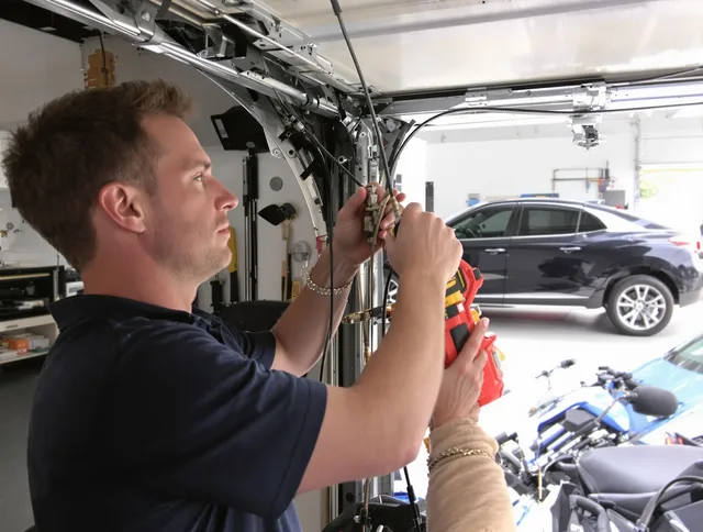 Glocester Garage Door Repair safety certified technician performing cable replacement in Glocester