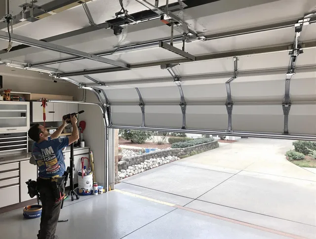 Garage door track repair service by Glocester Garage Door Repair in Glocester